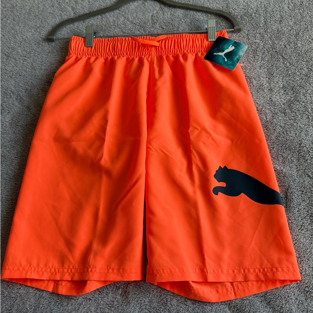 Puma Vibrant Orange Shorts. A swim trunks!